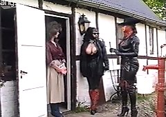Kinky latex mistresses examine pussy of one plum chick outdoor