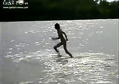 Nude teen girls swimming in the river